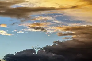 Thunderstorm Mood Photography Prints: Dramatic cloudy sky, dark thunderclouds at sunset