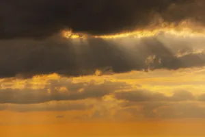 Evening Light Atmosphere Photos Prints: Dramatic cloudy sky in the evening