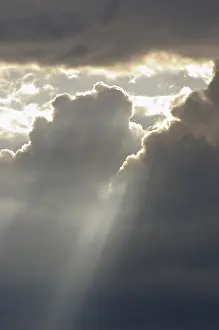 Backlit Photo Germany Prints: Dramatic cloudy sky with sun rays