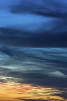 Cloudy Skies In Europe Prints: Dramatic dark clouds in the evening sky