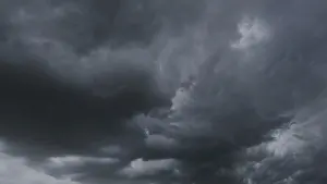 Gloomy Weather Forecast Prints: Dramatic dark storm clouds in sky background