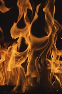 Dark Background Flames Prints: Dramatic flames against A dark background