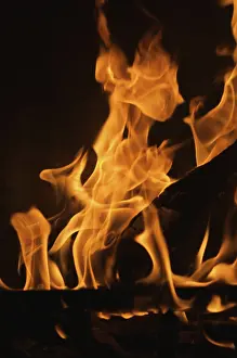 Dark Background Flames Prints: Dramatic flames against A dark background