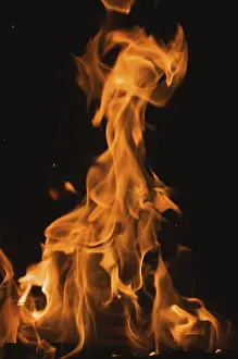 Dark Background Flames Prints: Dramatic flames against A dark background