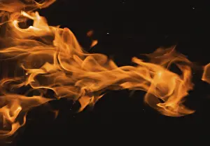 Dark Background Flames Prints: Dramatic flames against A dark background