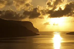 Evening Atmosphere Images Prints: Dramatic light mood, clouds, setting sun and the sea