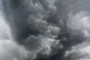Cloudy Atmosphere Photography Prints: Dramatic lighting mood with dark thunderclouds