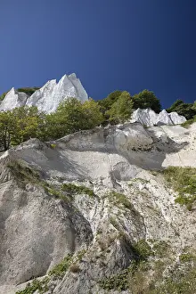 White Chalk Cliffs Prints: A dramatic low-angle view looking up the steep