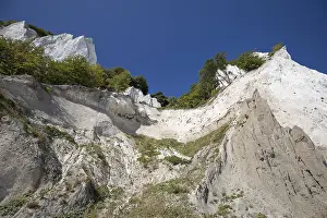White Chalk Cliffs Prints: A dramatic low-angle view looking up the steep