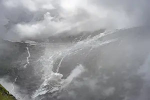 Dramatic Mountain Landscape Prints: Dramatic mountain landscape covered in clouds