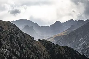 Deserted Mountain Valley Prints: Dramatic mountains and rocks, mountain valley