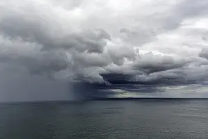 Nimbostratus Cloud Formations Prints: Dramatic rain clouds over the sea