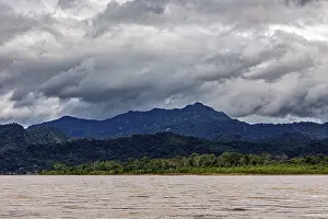 Bolivia River Landscape Prints: Dramatic sky over mountains and riverbanks