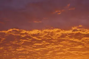 Central European River Landscape Prints: Dramatic sky with orange-red clouds at sunrise