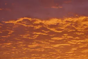 Southern Germany Scenic Views Prints: Dramatic sky with orange-red clouds at sunrise