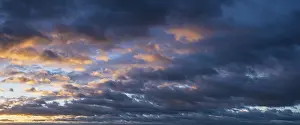 Dark Cloudy Sky Prints: Dramatic storm clouds in the morning light