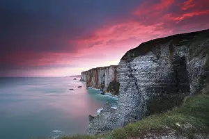 Rocky Coastline Photography Prints: Dramatic sunrise over cliffs in Atlantic ocean