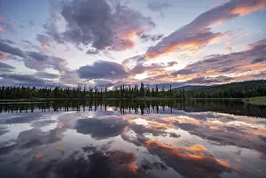 Dramatic Sunset Norway Prints: Dramatic sunset by the river Namsen with reflection