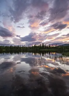 Dramatic Sunset Norway Prints: Dramatic sunset by the river Namsen with reflection