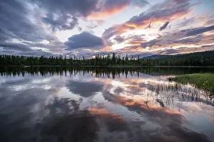 Dramatic Sunset Norway Prints: Dramatic sunset by the river Namsen with reflection