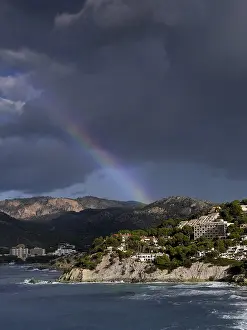 Prismatic Colors Of Nature Prints: Dramatic thunderstorm atmosphere with rainbow