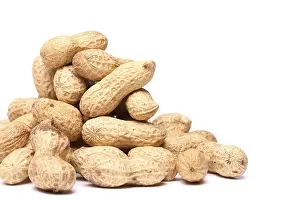 Bright Studio Shot Prints: Dried peanuts in closeup on a white background