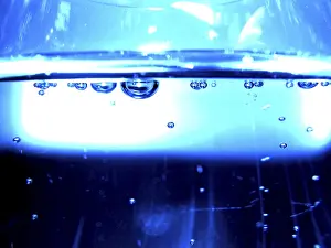 Horizontal Format Prints: Drinking water in a glas