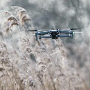 Marshland Landscape Photography Prints: Drone in flight over marshland