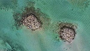 Prints of Drone shot, direct from above, detail, two rocky islets, shallow lagoon, turquoise sea, green sea, sandy beach, blue sky, lagoon, Elafonissi beach, southwest Crete, island of Crete, Greek Islands Aerial View Prints: Elafonissi Beach Print, Crete, Greece