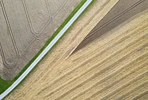 Upper Austria Agricultural Landscape Prints: Drone shot, road through harvested fields with abstract patterns