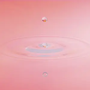 Deserted Lake Shore Prints: A drop of water dips into a water surface