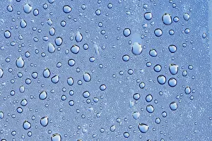 Water Droplets Prints: Drops of water on a blue surface
