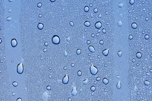 North Rhine Westphalia Waterfront Prints: Drops of water on a blue surface
