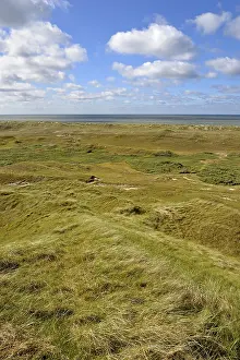 Lower Saxony Coastal Area Prints: Dune landscape with blue clouds