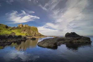 British Historic Sites Prints: Dunluce Castle reflected in ocean
