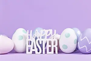 Traditional Easter Decoration Prints: Easter eggs and text Happy Easter on pastel violet background with copy space Easter eggs