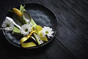 Spring Blooming Flowers Prints: Easter spring table dishware composition with yellow tulip flower
