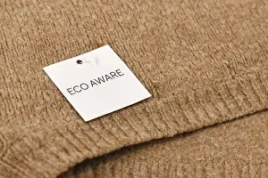Waste Separation Concept Prints: Eco aware label attached to environmental friendly produced pullover