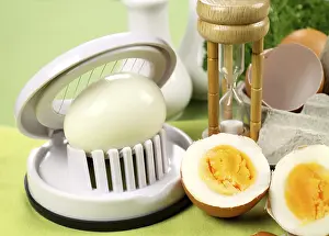 Boiled Eggs Prints: Egg slicer with boiled eggs and an egg timer