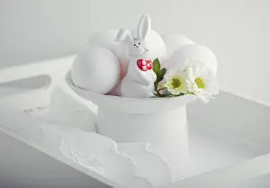 Easter Bunny Prints: Eggs Rabbit and flowers on white surface