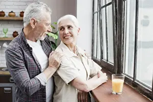 Elder Couple Looking Through Window Print