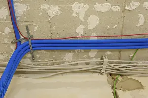 Construction Work In Germany Prints: Electric cables and conduits under the ceiling