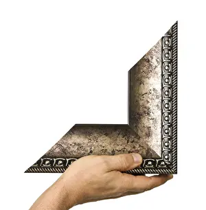 Isolated Picture Frame Prints: Element of the frame in hand isolated on a white background