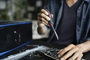 Electronic Repair Shop Prints: IT Engineer installing Hardware Equipment Development Facility Engineer Maintenance computer Motherboard Electronic