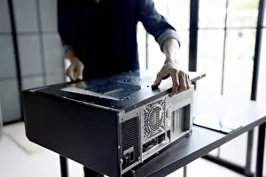 Images Dated 27th August 2024: IT Engineer Installing Hardware Equipment Print