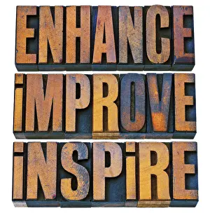 Vintage Letterpress Printing Prints: Enhance, improve, inspire - a collage of isolated motivational words in vintage letterpress wood type printing blocks