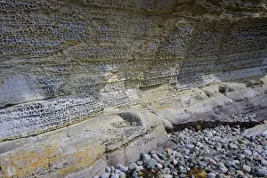 Elgol Beach Isle Of Skye Prints: Eroded rocks with complex texture on a coastline surrounded by small pebbles