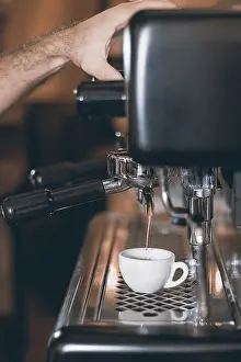 Uninhabited Coffee Shop Scene Prints: Espresso machine making coffee