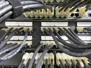 Ethernet Cable Connection Prints: Ethernet cables connected from patch panel to the network equipment with green lights