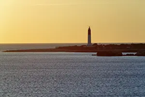 Backlit Lighthouse Photo Prints: Evening atmosphere at the lighthouse